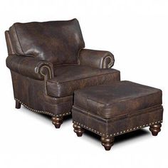 a brown leather chair and ottoman with nail polishing on the arm rests against a white background