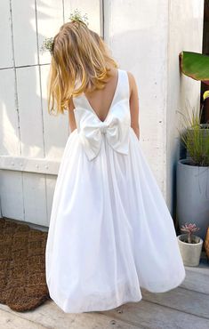 Style your little flower girl in White Taffeta! With a fun bow in the back, this dress is perfect for your little one to dance the night away! Flower Girl Dress White, Girl Dress White, Satin Flower Girl Dress, Bridesmaid Colors, Occasion Dresses Wedding, Dress Sleeve Styles, Wedding Flower Girl