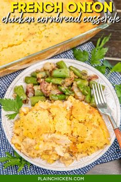 a white plate topped with food next to a casserole