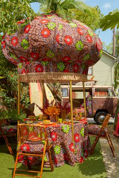 Onion canopy is upholstered with a removable Ankara cotton cover trimmed with jute fringe and finished with a functional vase finial for flamboyant plumes of ostrich feathers or showy palms. Vip Section, Johannesburg South Africa, Johannesburg South, Stone Pathway, Tent Poles, Brown Cushions, Garden Cafe, Backyard Barbecue, Grill Master