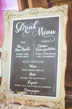 a chalkboard sign that says drink menu