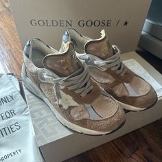 Golden Goose Dad Star Sneakers Tan And Silver! Just Don’t Wear Them Much Anymore. I Have The Box, Dust Bag, And Original Receipt. Golden Goose Dad Star, Star Outfit, Shoes Golden Goose, Goose Shoes, Golden Goose Shoes, Star Sneakers, Box Bag, Golden Goose, Just Don