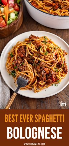 the best ever spaghetti bolognesee is served on a white plate