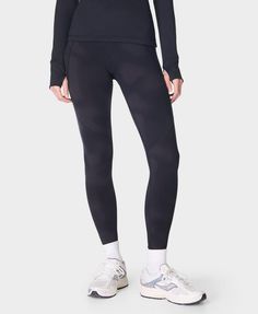 Multi-sport gym leggings designed for every workout. Super stretchy fabric with flattering seams to sculpt the bum. Sweat-wicking and quick-drying for all sports. Side pocket and back zip pocket. Internal adjustable drawcord. Inseam length: 27" / 68cm. Model wears size S and is 178cm/5'10" tall. Style Code: SB5400AColour: Black Faded Houndstooth Print Sporty Compressive Leggings For Training, Sporty Compressive Training Leggings, Squat Proof Elastane Tights For Athleisure, Compressive Athleisure Tights For Training, Squat Proof Athleisure Elastane Tights, Squat Proof Athleisure Tights, Black 4-way Stretch Yoga Pants For Jogging, Sporty Go-dry Tights For Training, Compression Activewear With Contoured Waistband For Training