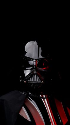 a darth vader helmet is shown in the dark