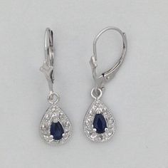 "SOLID 14KT WHITE GOLD EARRINGS NATURAL SAPPHIRE IS 5x3 mm PEAR SHAPE (0.60 TCW) NATURAL DIAMOND IS 0.10 TCW EARRING LENGTH IS 1\" INCH COMES IN GIFT BOX" Elegant Teardrop Jewelry With Diamond Accents, Formal Pear-shaped White Gold Earrings, Formal White Gold Pear-shaped Earrings, Formal Jewelry With Diamond Accents, Elegant Teardrop Sterling Silver Jewelry, Elegant Drop Sterling Silver Jewelry, Formal Drop Jewelry With Diamond Accents, Teardrop Diamond Accents Fine Jewelry, Formal Teardrop Jewelry With Diamond Accents