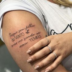 a woman with a tattoo on her arm that says, i hope you are born