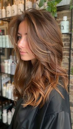 Milk Chocolate, a delectable hair color trend for brunettes in 2024. This soft, warm shade blends subtle caramel tones with deep chocolate, creating a luxurious and sophisticated look that enhances your natural beauty. Click the pin to explore more and follow us for the latest in hair color inspiration! #MilkChocolateHair #BrunetteBeauty #2024HairTrends #HairColorInspo #LuxuryHair Milk Chocolate Hair, Hair Color Brown Chestnut, Hair Color Inspiration, Colors For 2024, Chestnut Brown Hair, Warm Brunette, Bronze Hair, Blonde Fashion, Hair Color Chocolate