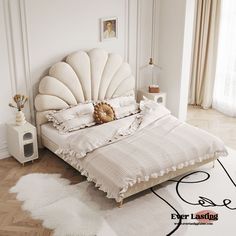 a white bed sitting in a bedroom on top of a hard wood floor next to a window