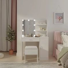 a bedroom with a bed, desk and mirror