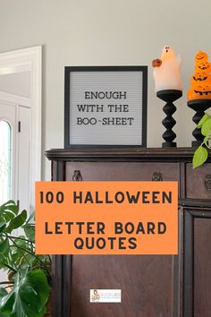 a wooden cabinet with halloween decorations on top and an orange sign that says, enough with the boo - sheet