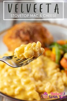 a fork with macaroni and cheese on it