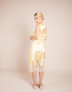 Pale yellow asymmetric silk skirt with metallic french lace Fastens with invisible zip at central backComposition: 100% Silk / Lace: 75% Lurex 25% NylonDry Clean OnlyFit and Model SizeModel wears UK size 6 and is 5'8'' (172 cm) Fits true to size, however those who are between sizes should take the larger size Light weight fabric, non stretch Designed to be fitted at waist, loose cut Silk Midi Skirt, Silk Tulle, Summer 22, Natural Colours, Silk Skirt, French Lace, Pale Yellow, Silk Top, Cloth Bags