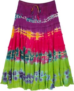 A rayon multicolored summer skirt with its harmonious balance of various bright tie-dye color tones is sure to bring glam to your look.  The skirt is in tie-dye pattern and has an elastic waist for ease of comfort. #tlb #TieredSkirt #vacationclothing #beachwrap #TieDye #TieDyeSkirt #VacationSkirt Hippie Multicolor Flowy Maxi Skirt, Multicolor Tiered Hippie Skirt, Vibrant Summer Skirt, Hippie Tie-dye Skirt For Beach, Hippie Tie-dye Skirt For The Beach, Bohemian Tie Dye Tiered Skirt, Bohemian Tiered Tie Dye Skirt, Bohemian Multicolor Skirt For Spring, Summer Beach Tie Dye Skirt