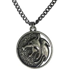 Geralt's medallion necklace is an exact replica of the medallion worn by Henry Cavill in Netflix: The Witcher television series. Great as a cosplay piece as well as casual jewelry attire. The 2-inch diameter medallion features a molded flat relief design and is made from zinc alloy. The 30-inch long chain is made of iron. Packaged in wooden collector's case measuring 3.75 x 4.5 x 1 inches. Officially licensed. Wolf Medallion, Witcher Medallion, Witcher Geralt, The Witcher Geralt, Relief Design, Casual Jewelry, Replica Prop, White Wolf, Medallion Necklace