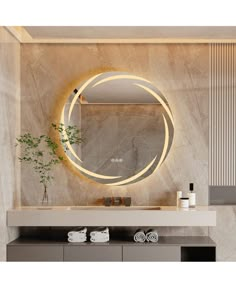 a bathroom with a round mirror on the wall