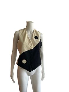 Moschino Cheap & Chic Yin Yang 90s super rare vest . 80 % wool . Size best for XS / S . Chest 98 cm, back 29 cm, length 58 cm Cheap 90s Style Vest Tops, Retro Fitted Sleeveless Outerwear, Fitted Sleeveless Patchwork Vest, Vintage Sleeveless Wool Sweater Vest, Vintage Fitted Sleeveless Outerwear, Vintage Wool Sleeveless Sweater Vest, Fitted Wool Sweater Vest In Vintage Style, Fitted Sleeveless Vintage Outerwear, Retro Sleeveless Outerwear For Work