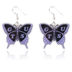 pair of purple and black butterfly shaped earrings with the words gubs on each side