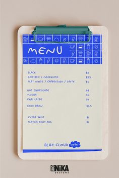 a clipboard with a menu written in blue on the front and bottom part of it