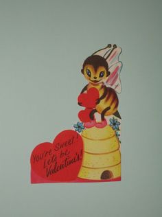 a valentine card with a bee holding a heart