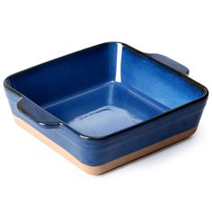 a blue and brown square dish on a white background