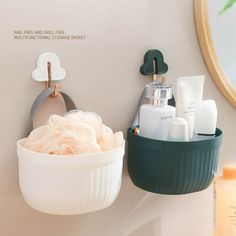 a bathroom sink with soap and lotion on the wall next to it is shown