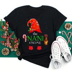 Buy The Nani Gnome Christmas Cute Gnome Pajama Matching Family Shirt at Fantasywears. Hight quality products with perfect design is available in a spectrum of colors and sizes, and many different types of shirts! Unisex T-Shirt – 100% Cotton (fiber content may vary for different colors) – Medium fabric (5.3 oz/yd² (180 g/m²)) – Classic fit – Tear away the label – Runs true to size Women T-Shirt – 100% combed ringspun cotton (fiber content may vary for different colors) – Light fabric (4.3 oz/yd² Xmas Pajamas, Matching Family Christmas Pajamas, Gnome Christmas, Family Shirts Matching, Family Christmas Pajamas, Xmas Shirts, Funny Christmas Shirts, Everything Is Fine, Family Shirt