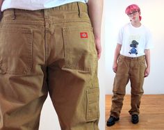 Dickies Carpenter Pants Outfit Men, Vintage Brown Cargo Pants With Pockets, Vintage Brown Bottoms With Cargo Pockets, 90s Style Brown Bottoms With Pockets, Retro Brown Bottoms For Streetwear, Vintage Brown Jeans With Pockets, Vintage Brown Bottoms For Streetwear, Vintage Brown Cargo Pants With Belt Loops, Vintage Brown Work Pants With Pockets