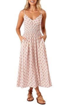 A bold floral pattern enhances the vintage-inspired sophistication of this flowy midi dress. V-neck Adjustable straps Smocked waist Side-seam pockets Lined 100% rayon Hand wash, line dry Imported