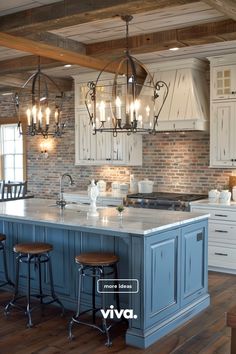 a large kitchen with an island and bar stools