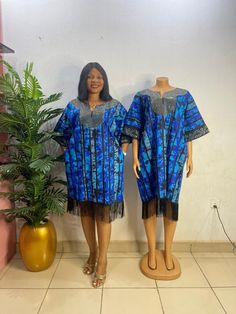 Breathtaking short style boubou dress. With beautiful silver detailing on the neckline and sleeves. Finished with fringe hem. You will surely be turning heads in this elegant dress. Short Boubou Gown Styles, Ankara Dress Styles With Fringes, Short Bubu Gown With Fringe, Ankara Bubu Gown Styles With Fringes, Bubu Gown With Fringe, Short Bubu Dress, Boubou With Fringe, Asoebi Designs, Ankara Boubou