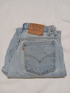 These are ladies sz 8 reg. Long 921 Levi's in great vintage condition Vintage Mid-rise Jeans With Pockets, Vintage Light Wash Mid-rise Jeans, Light Wash Mid-rise Vintage Jeans, Vintage Light Wash Bottoms With Five Pockets, Vintage Light Wash Jeans With Belt Loops, Vintage Mid-rise Denim Blue Jeans, Vintage Medium Wash Bottoms With Five Pockets, Vintage Faded Bottoms With Belt Loops, Vintage Faded Mid-rise Jeans