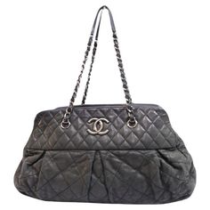 Chanel Chic Quilted Bowler Bag, Features CC Logo, zip Closure, Chain Strap and Three Interior Pocket. Material: Leather Hardware: Silver Height: 26cm Width: 39cm Depth: 16cm Shoulder Drop: 26cm Overall condition: Fair Interior condition: Signs of use External condition: Scuffing and hardware tarnish Chic Quilts, Bowler Bag, Shoulder Bag Black, Cc Logo, Bag Shoulder, Bago, Fashion Handbags, Chain Strap, Chanel