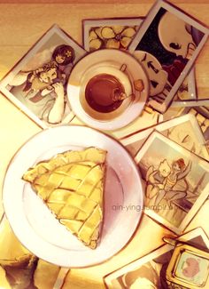 a table topped with pictures and a piece of pie next to a cup of coffee