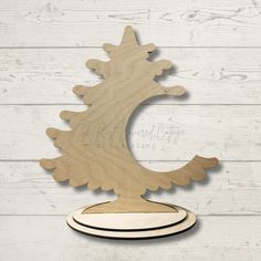 a wooden cutout of a christmas tree