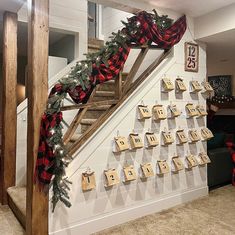 a staircase decorated with christmas decorations and garlands for the holiday season is featured in this postcard display