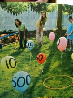 an advertisement for balloons with the number twenty five on it and people in the background