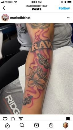 a person with a tattoo on their arm that reads raw and has butterflies around it