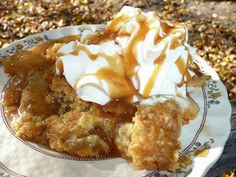 a close up of a plate of food with ice cream and caramel on top