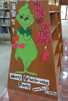 a sign that is on the side of a book shelf in a store, advertising merry grin - mas party