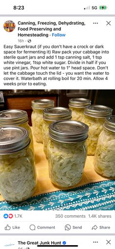 several jars filled with food sitting on top of a table