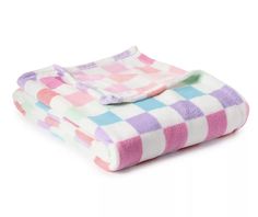 two towels folded on top of each other in pink, blue and green checkered