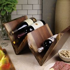 two wooden wine racks with bottles in them