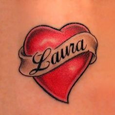 a tattoo that says lavaa on the side of a woman's back shoulder