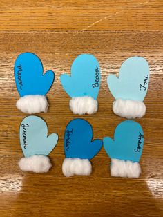 four blue and white paper hearts with the words happy father's day written on them