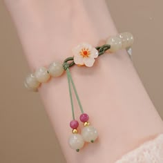 🌺 Please follow this link to visit my store to find more great widgets: https://www.etsy.com/shop/CrystalpipesStore?ref=simple-shop-header-name&listing_id=904320137 🌺 Please pay attention before buy The jade bracelet is difficult to be flawless, it may contain some small strips, or the color may be dark or light than what you see in the picture. Take note before buying, but as a whole, the product looks great. 🌺 Processing time After placing the order, it usually takes 3-5 working days to com Adjustable Flower Crystal Bracelet Gift, Adjustable Spiritual Flower Bracelet, Adjustable Flower-shaped Spiritual Bracelets, White Adjustable Jade Bracelets, Adjustable White Jade Beaded Bracelets, Adjustable Flower Beaded Bracelet With 8mm Beads, Rope Jewelry, Hetian Jade, Jade Bracelet