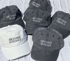 six hats that say getting hitched, getting drunk and getting shot printed on them