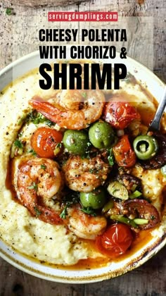 a bowl filled with shrimp and vegetables on top of mashed potatoes, garnished with