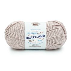 a ball of yarn with the words heartland on it