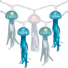 blue and white string lights with jellyfish decorations hanging from it's sides on a white background